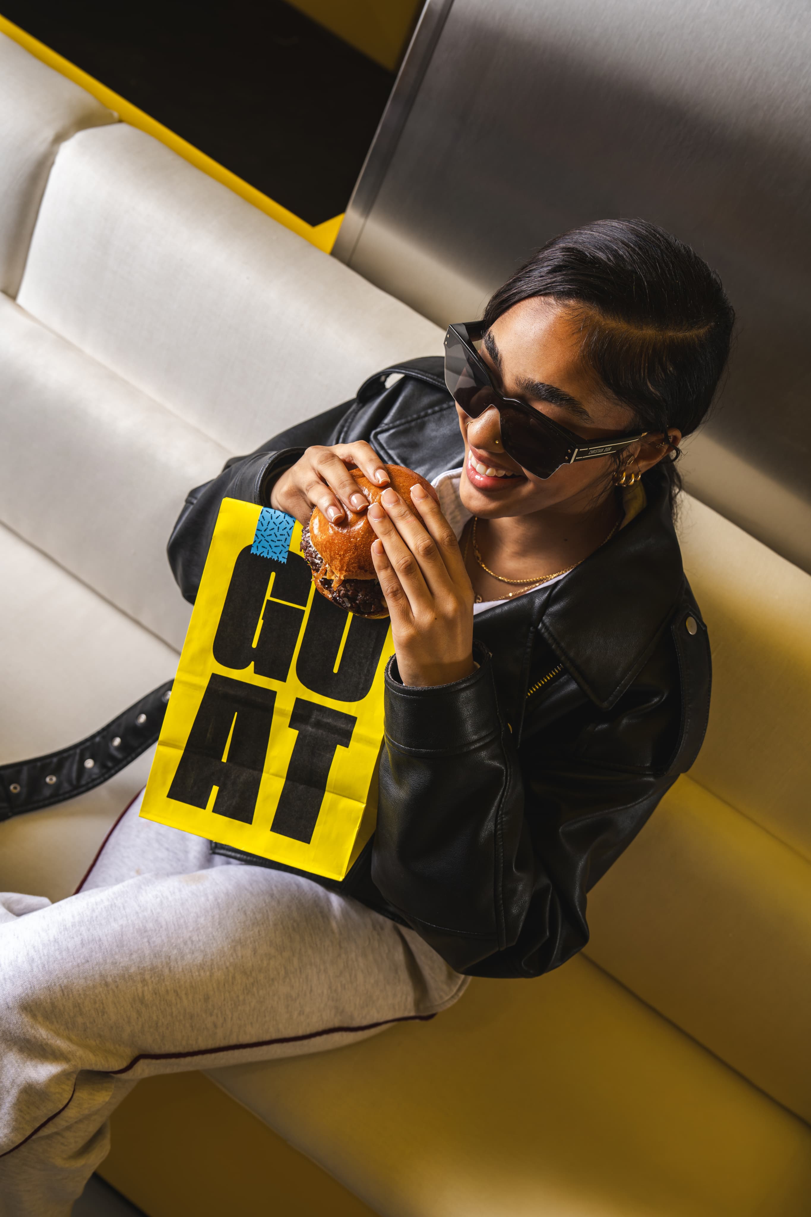 Guest eating a burger